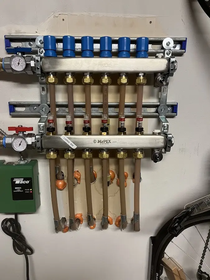 Plumber performing Leak Detection at a residential property in Weare